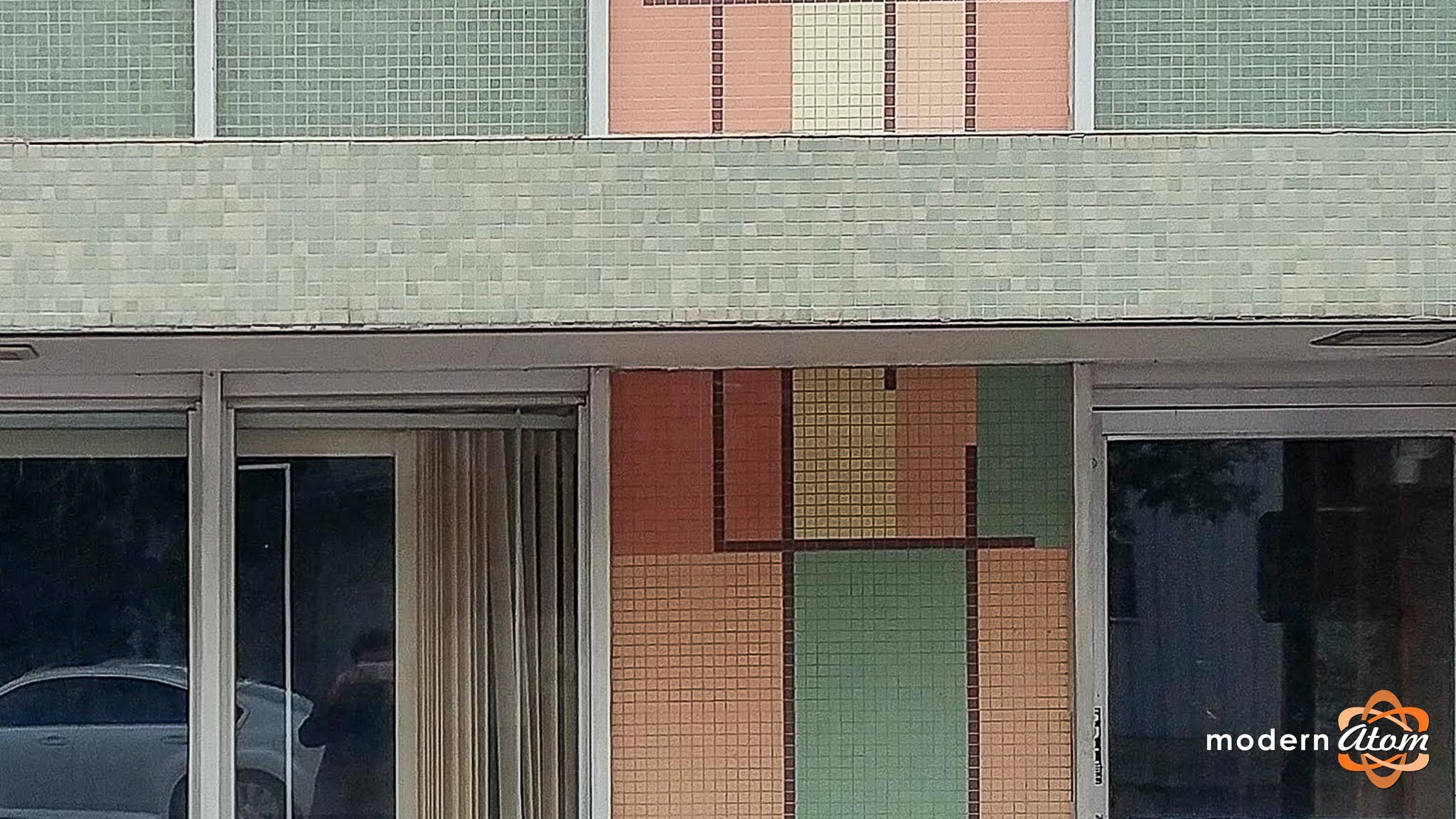 Mosaic tile façade on a mid-century modern commercial building in Denver’s Overland neighborhood.